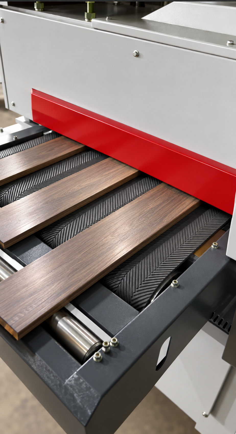 Wood boards passing through a texturing machine