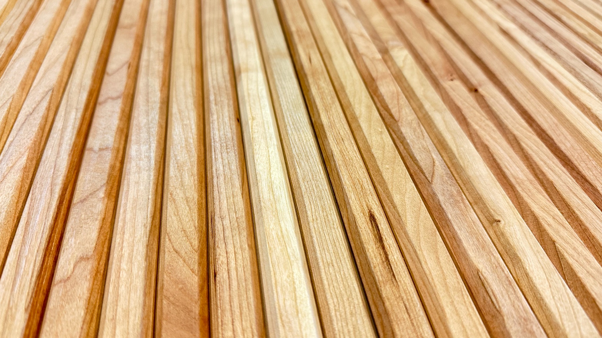 Close-up of narrow machined wood Tambour slats